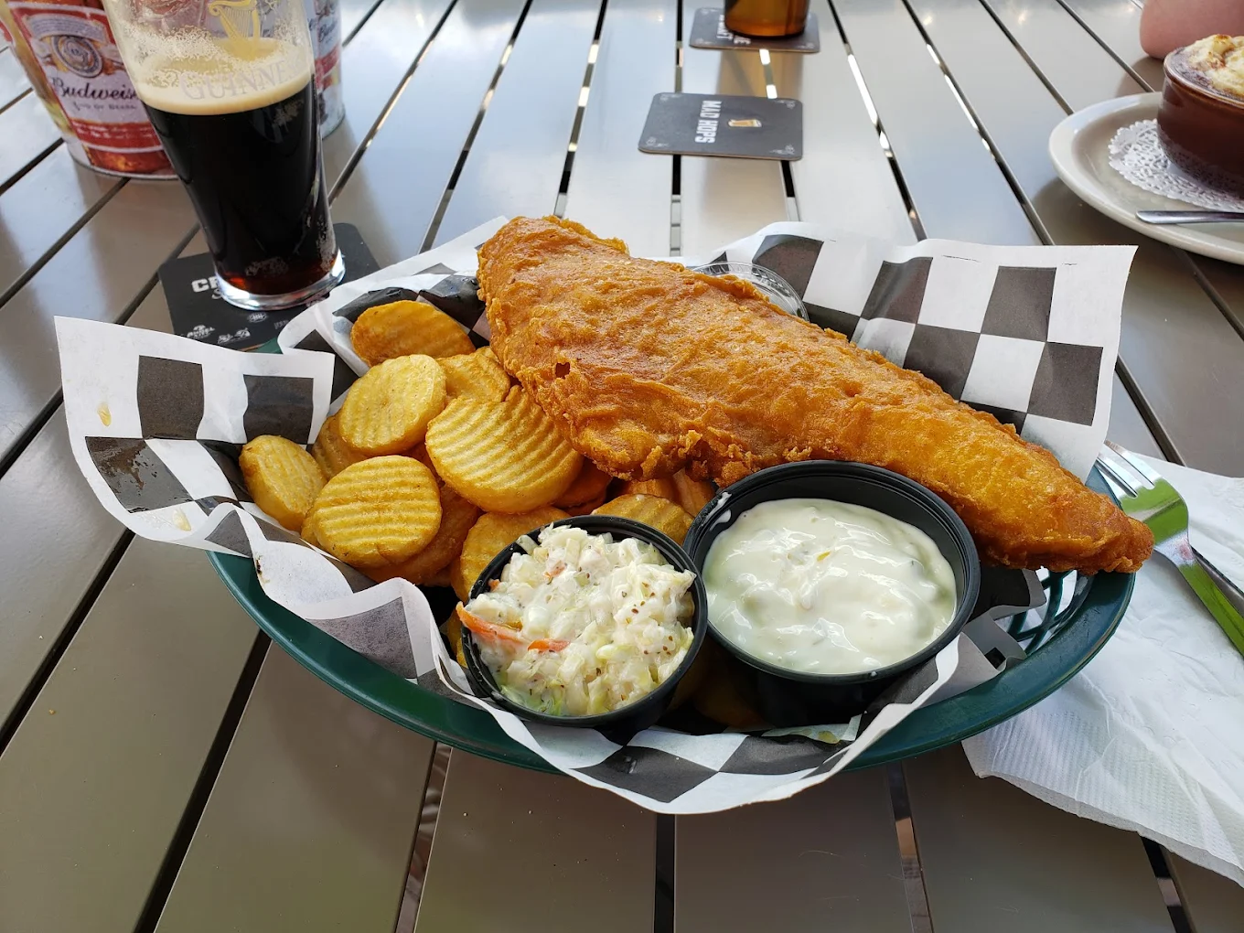 Beer-battered fish and chips with tartar sauce